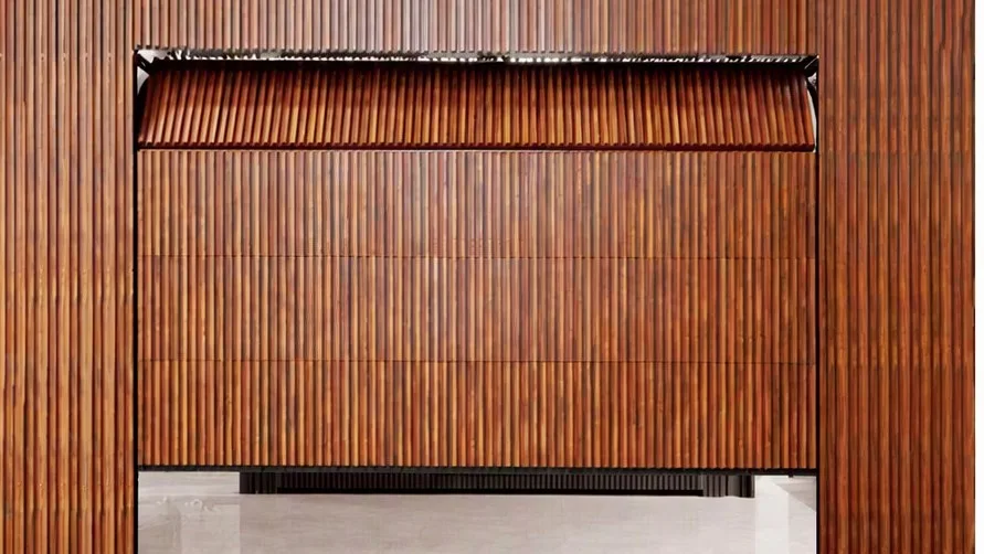 Wood-batten aluminium sectional garage door, flush with the wall